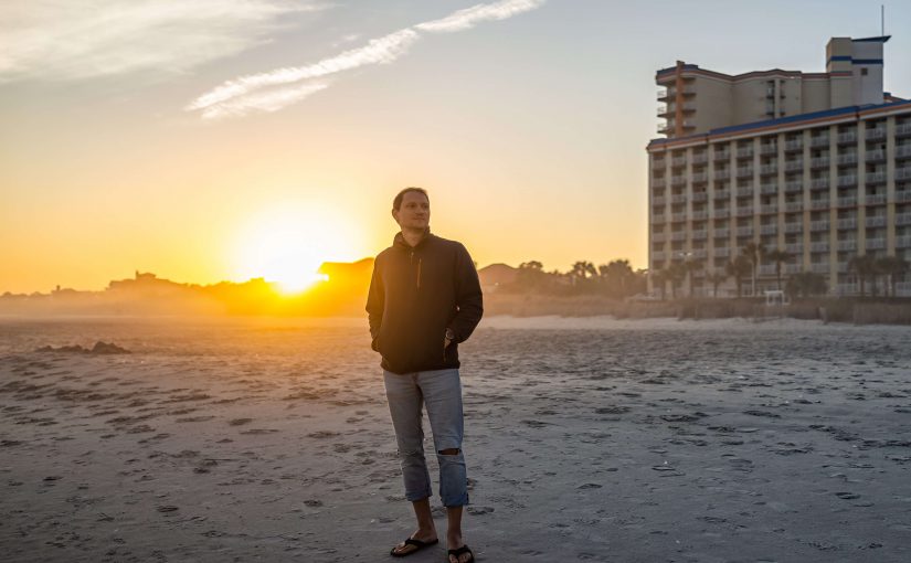 A man watching a Sunset in Myrtle Beach.