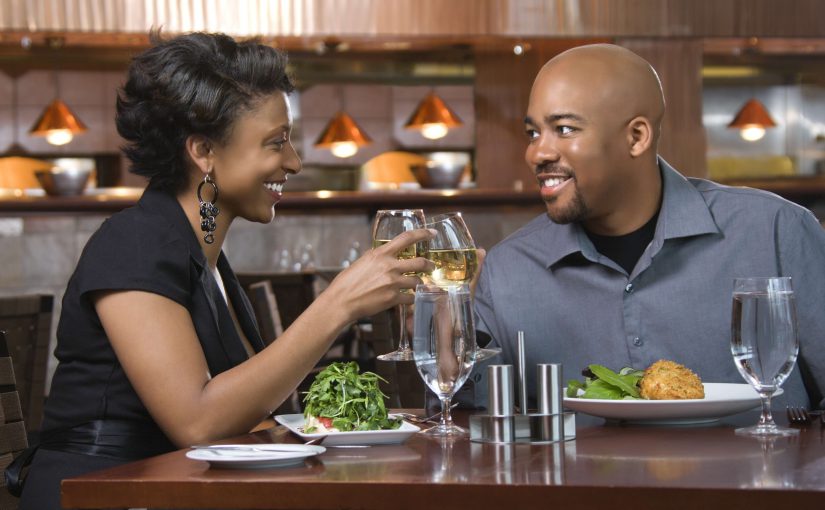 A woman and a man enjoy Restaurants Near Myrtle Beach